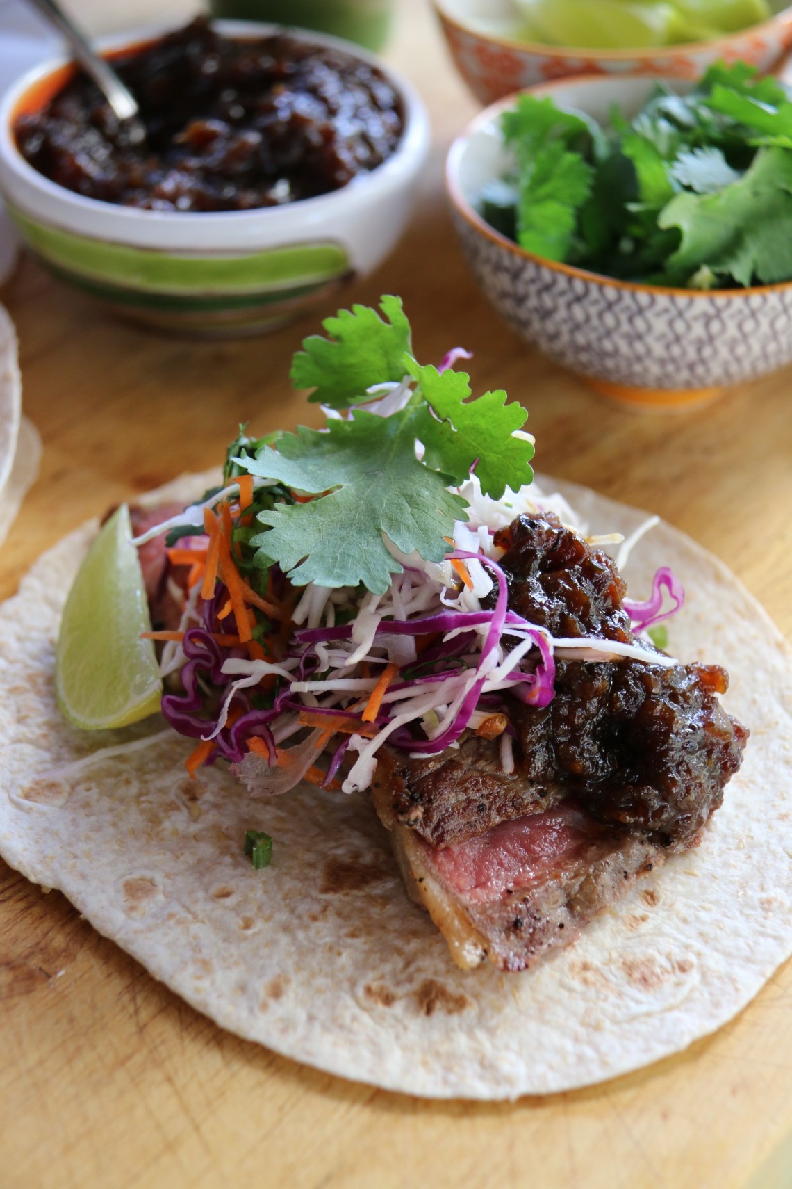 Soft Tortillas with grilled, spiced, sirloin and ale and onion jam. 